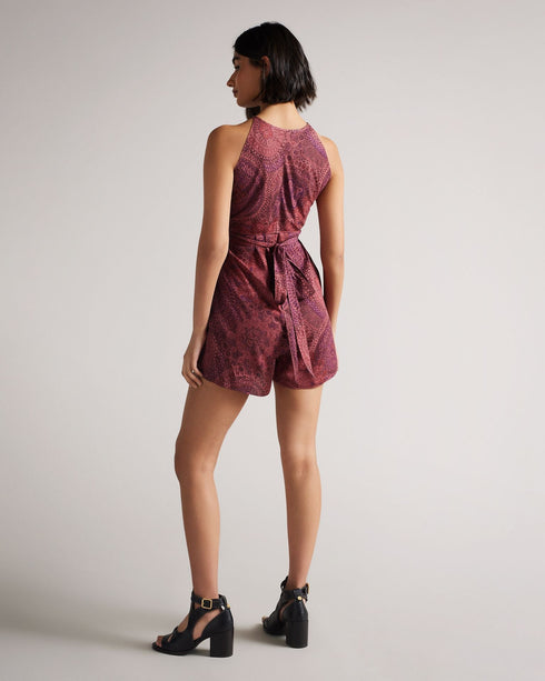 ODESIA-Trousers-Embrace playful prints and flowing shapes this season. ODESIA features our Paisley print and a wrap-around style, which creates a flattering silhouette for day and night outings.This product is made using LENZINGâ„¢ ECOVEROâ„¢ fibers. LENZINGâ„¢ ECOVEROâ„¢ fibers are derived from sustainable wood and pulp, coming from certified and controlled sources, with up to 50% lower emissions and water impact compared to generic viscose. LENZINGâ„¢ and ECOVEROâ„¢ is a trademark of Lenzing AG. Ted Baker